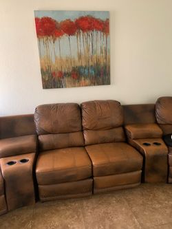 4 Recliner 2 Console Sectional