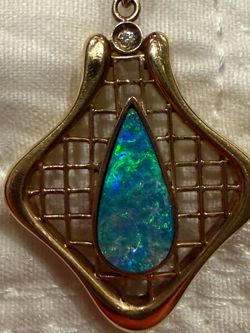 14k  Opal Pendant with 19” Rope Chain