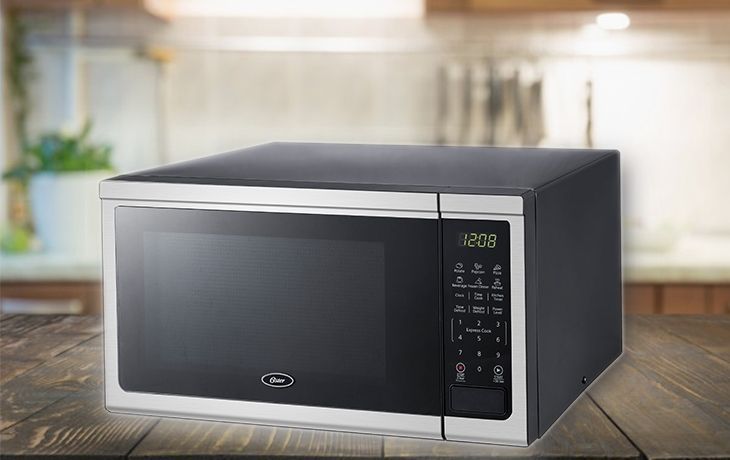 OSTER 1.1 C-ft 1000 Watt Microwave