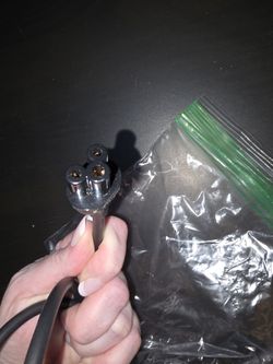 Mickey Mouse Head On One Side Of Cord And A 3 Prong On The Other 