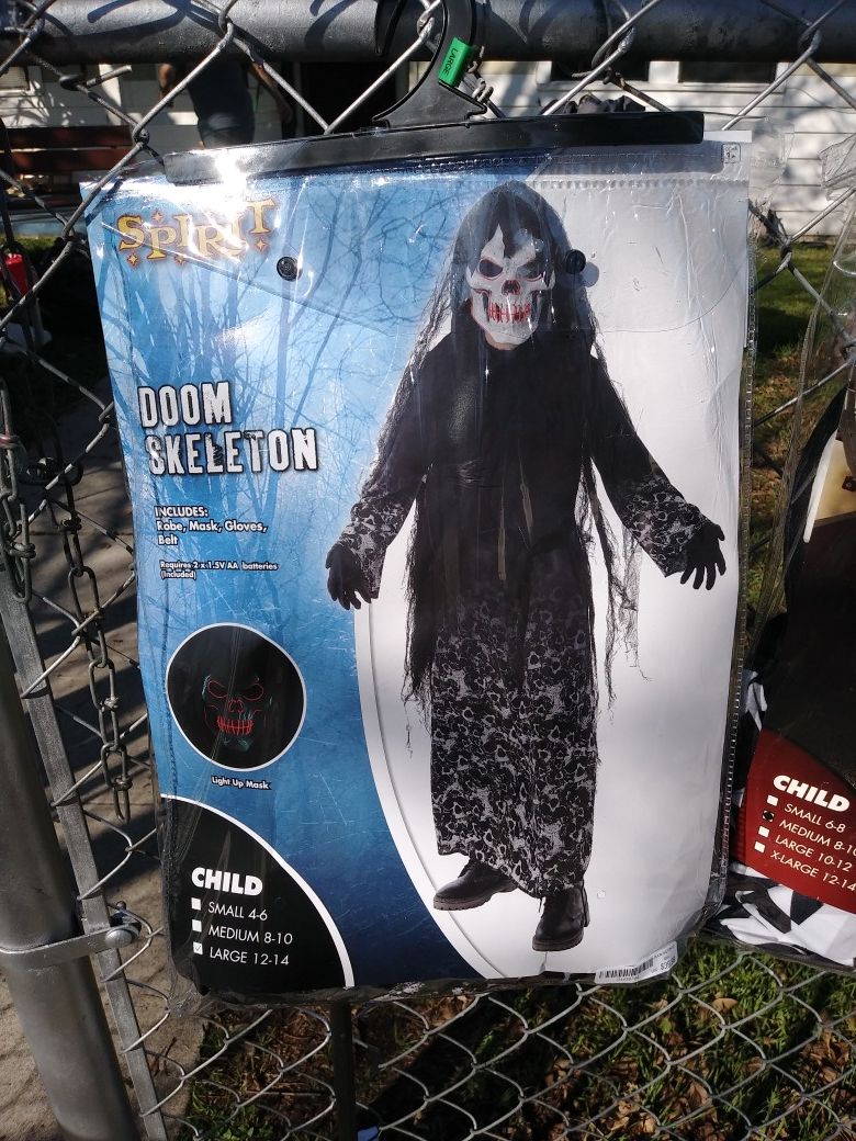 Halloween costumes used once (skeleton large boys 12-14) (jester med boys 8-10)