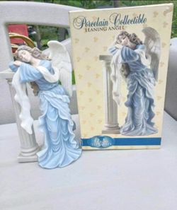 Porcelain Leaning Angel