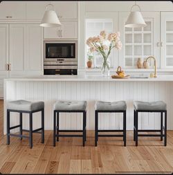 4 upholstered bar stools with 24-inch metal seat