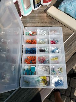 Assortment of brads for scrapbooking and case