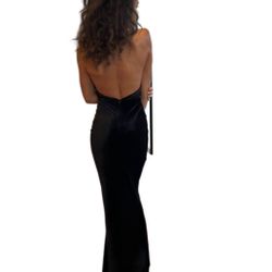 Exclusive velvet long cocktail evening prom dress featuring a stunning feather broche n the front
