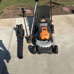 The Works Battery Lawnmower And Accessories 