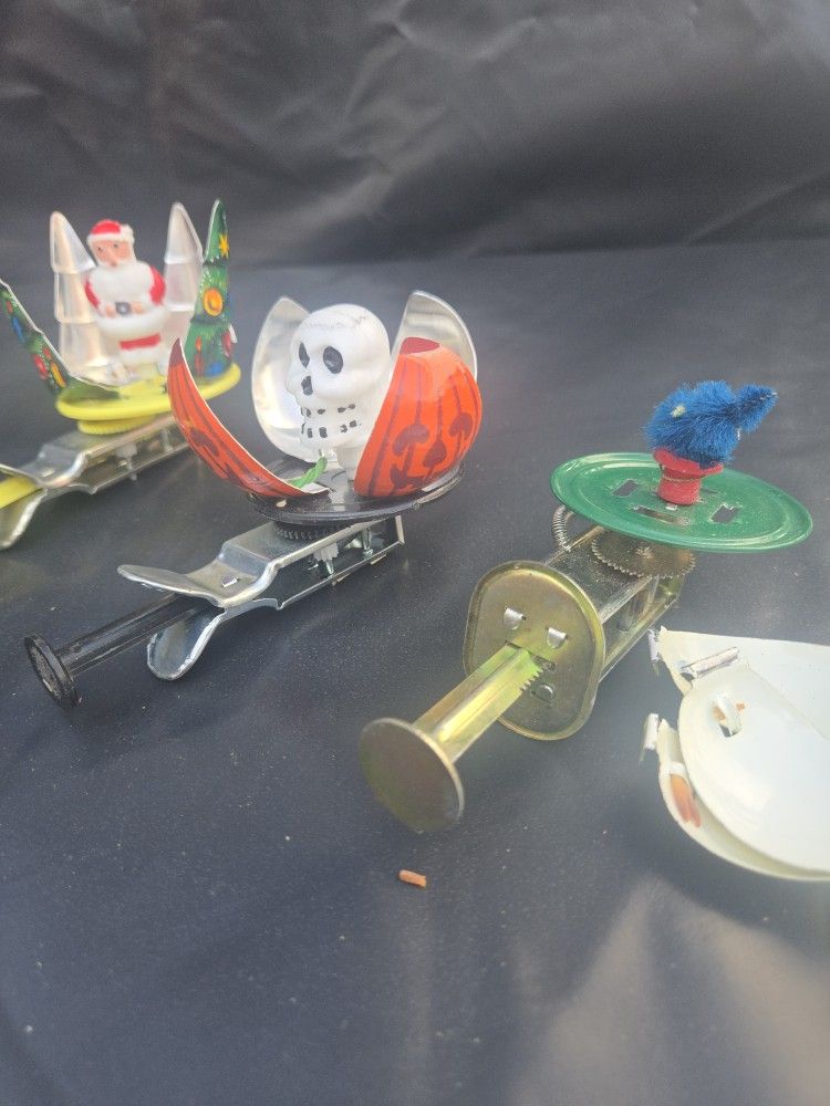 Old tin wind up toys $60 All 3