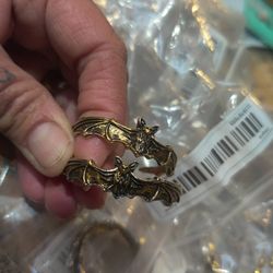24 Pairs Of Golden/Silver Bat Earrings
