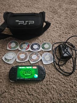 Sony PSP Playstation Portable 3000 with 1GB Memory card and 8 UMDs