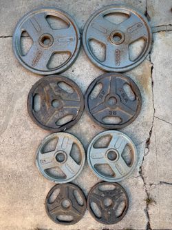Olympic Weights 45s 35s 25s and 10s all for $190 firm. A bit dirty but there solid weights.