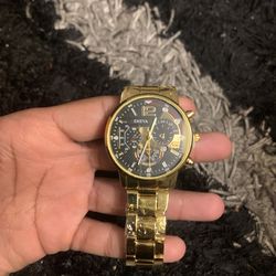 Gold & black watch