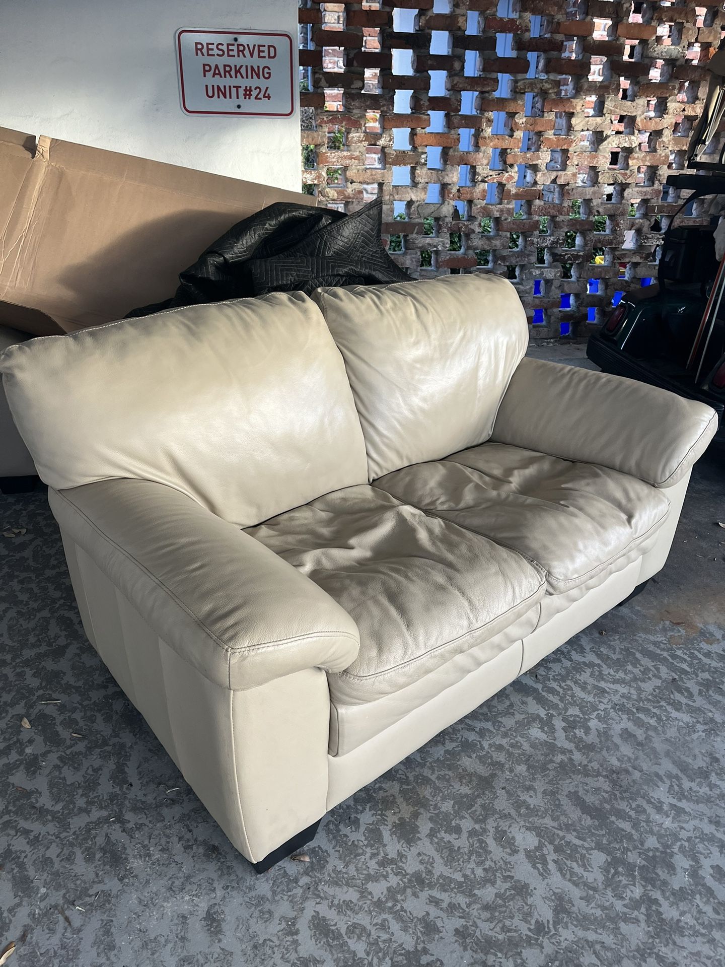 2 X Leather Loveseat $75each