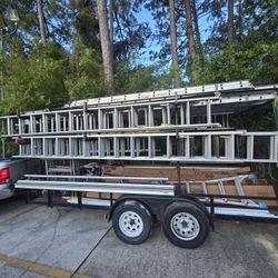 16' trailer with lots of stairs and a folding machine