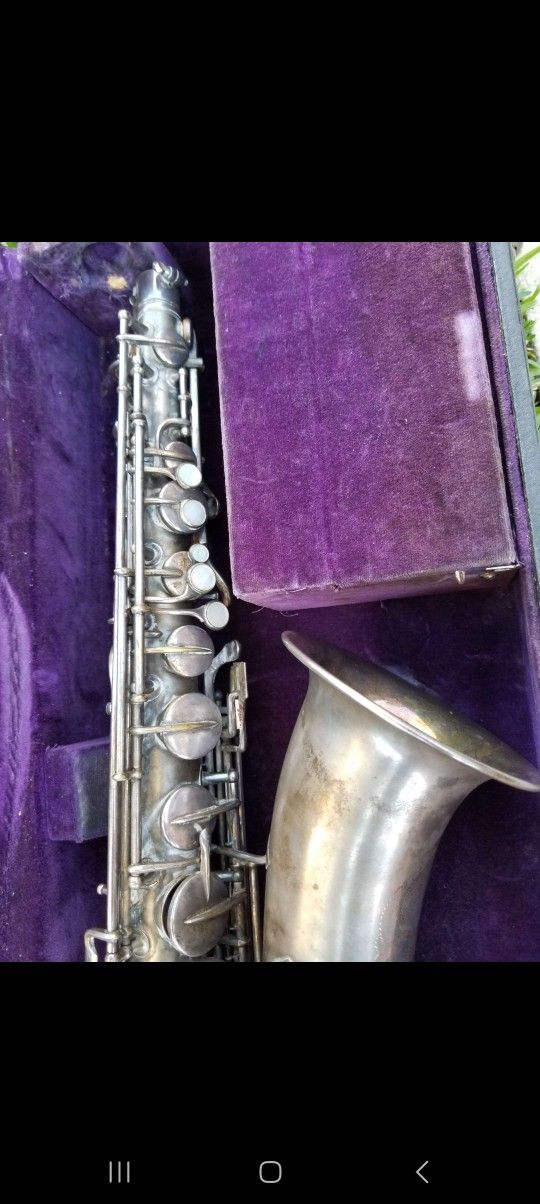 C Melody Saxophone by C.G. Conn, dated 1921