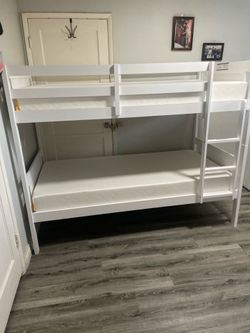 Twin bunk bed. Available in espresso, white, & grey. Bunk bed only-$299. With mattresses-$450. Assembly required. Assembly not included. Tax included.