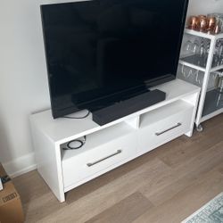 TV, Sound Bar, and TV Stand 