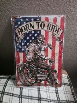 Biker metal sign