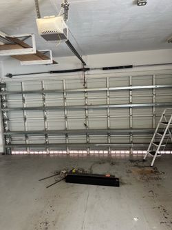 Garage Door Opener Broken Spring Off Track Adjustment Replace And Parts