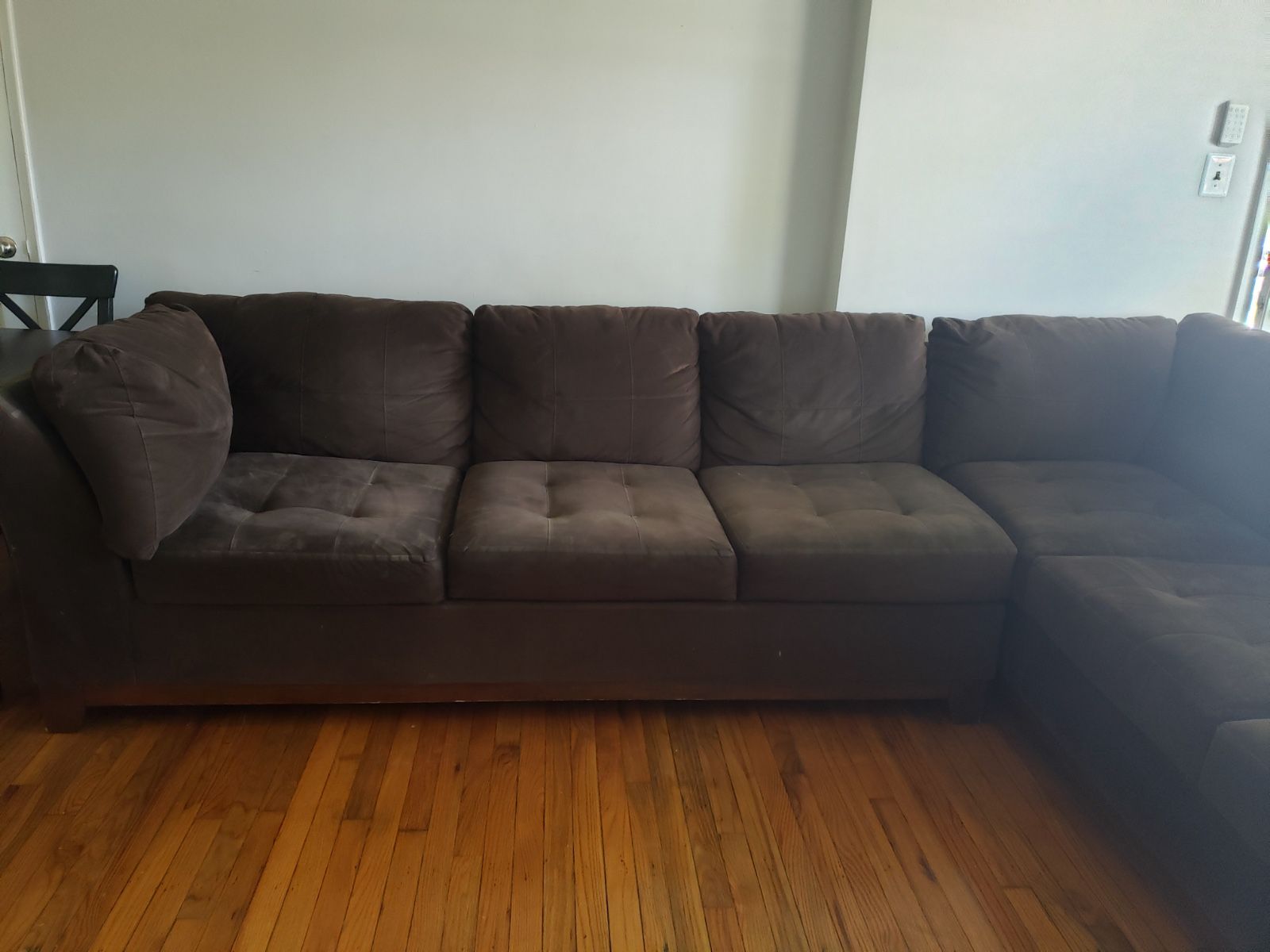 Brown Microfiber sectional couch.