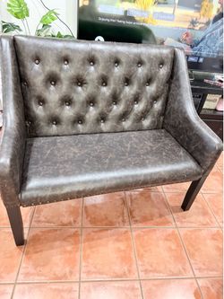 Leather coach