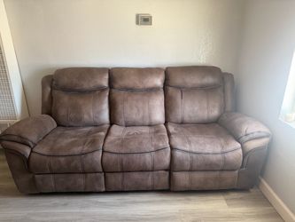 Brown Reclining Loveseat with Cup Holder
