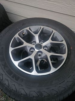 Brand new set of jeep wrangler wheels and tires