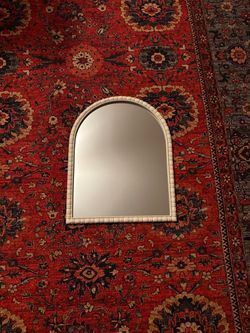 White rimmed mirror