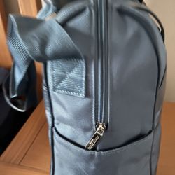 It’s Very Good Duffle Bag Made By GORGIO Armani. The Color Is Teal.