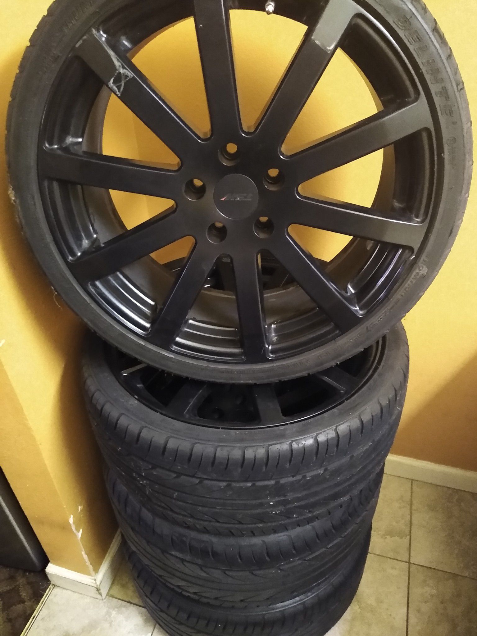 2 Sets of Rims With Tires