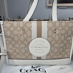 Coach Dempsey Carryall in Signature Jacquard with Stripe and Coach Patch tote bag. 