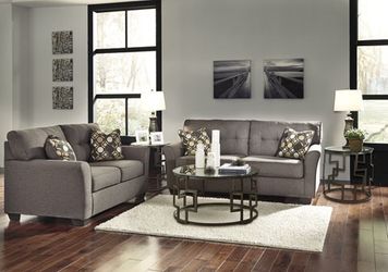 New Ashley sofa and love Wholesale Furniture Center 25 w 39th street Kansas City mo 64111