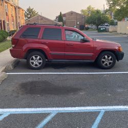Grand jeep Cherokee,Red 4x4 Laredo