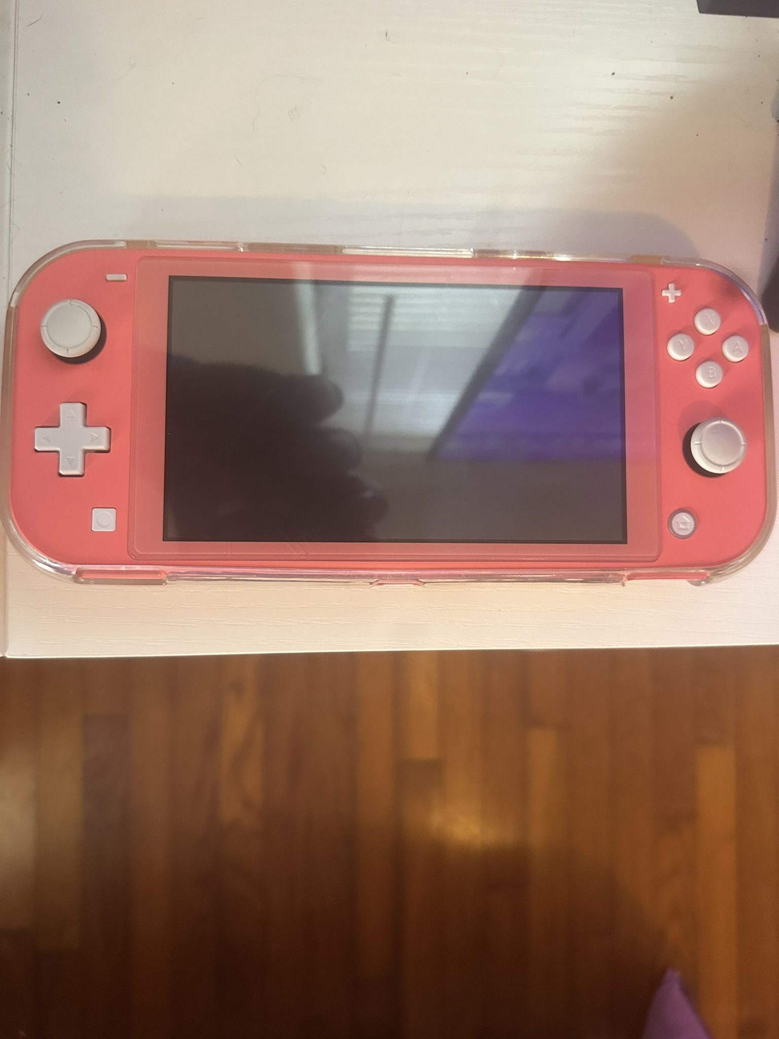 Nintendo Switch Lite And 2 Games