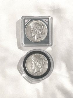 About uncirculated sealed in cases 1922 and 1923 piece silver dollars. Valued $90 each
