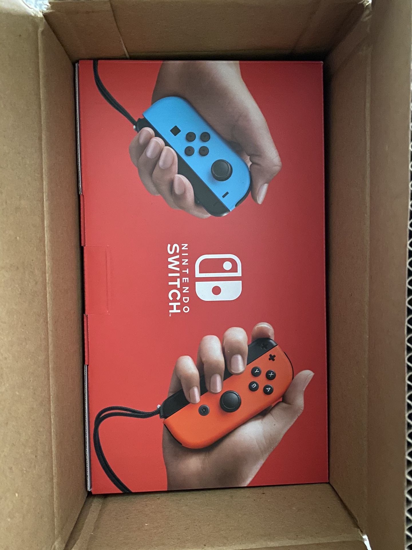 Nintendo Switch with Neon Blue and Neon Red Joy‑Con