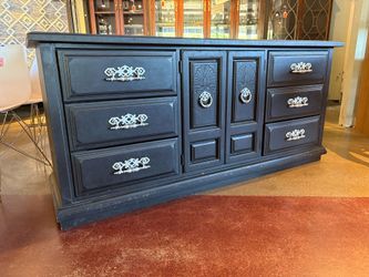 Black Dresser with Ornate Carved Door Panels