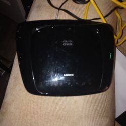 One Cisco Wireless Broadband Router W LAN Cord Dial Cord W Charger
