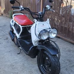 2013 Honda Ruckus little great Motorcycle runs  tags at day title on hand. K 5.3 MILES ON IT 