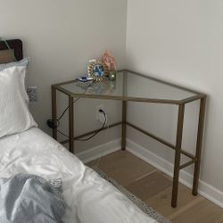gold metal and class corner table