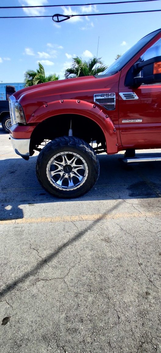 35x12 R20.  8 Lug Truck Rims And Tires