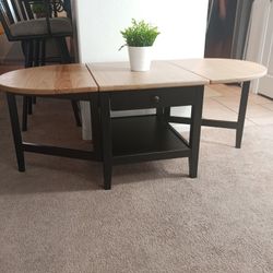 Clean great condition Ikea Arkelstorp drop leaves Black body natural wood top coffee table