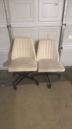 Two Tan Chairs