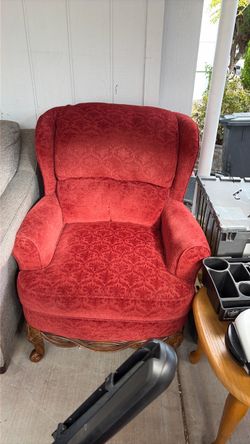 Beautiful red wing back chair hectic condition no stains tears $45