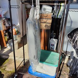 Rolling wardrobe rack