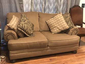 1 Love Seat ( Ashly Furniture )In Good Condition