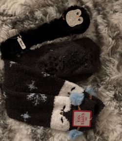 Super cute and super soft Pinguin Slipper Socks & Pinguin Fuzzy Slap Bracelet. New with tags. Asking $8 for both. retail $8 to $6 each. Girls love the