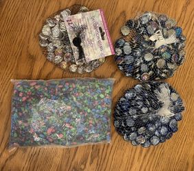 $2 per bag…New decorative glass gems/marbles.  Great for floral arrangements/crafts/decor projects/floating candles.  Please pickup in the area of 36t