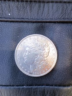 1884 O/O Morgan Dollar $179