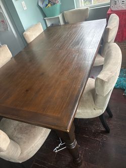 Big dinning room table used with 6 chairs