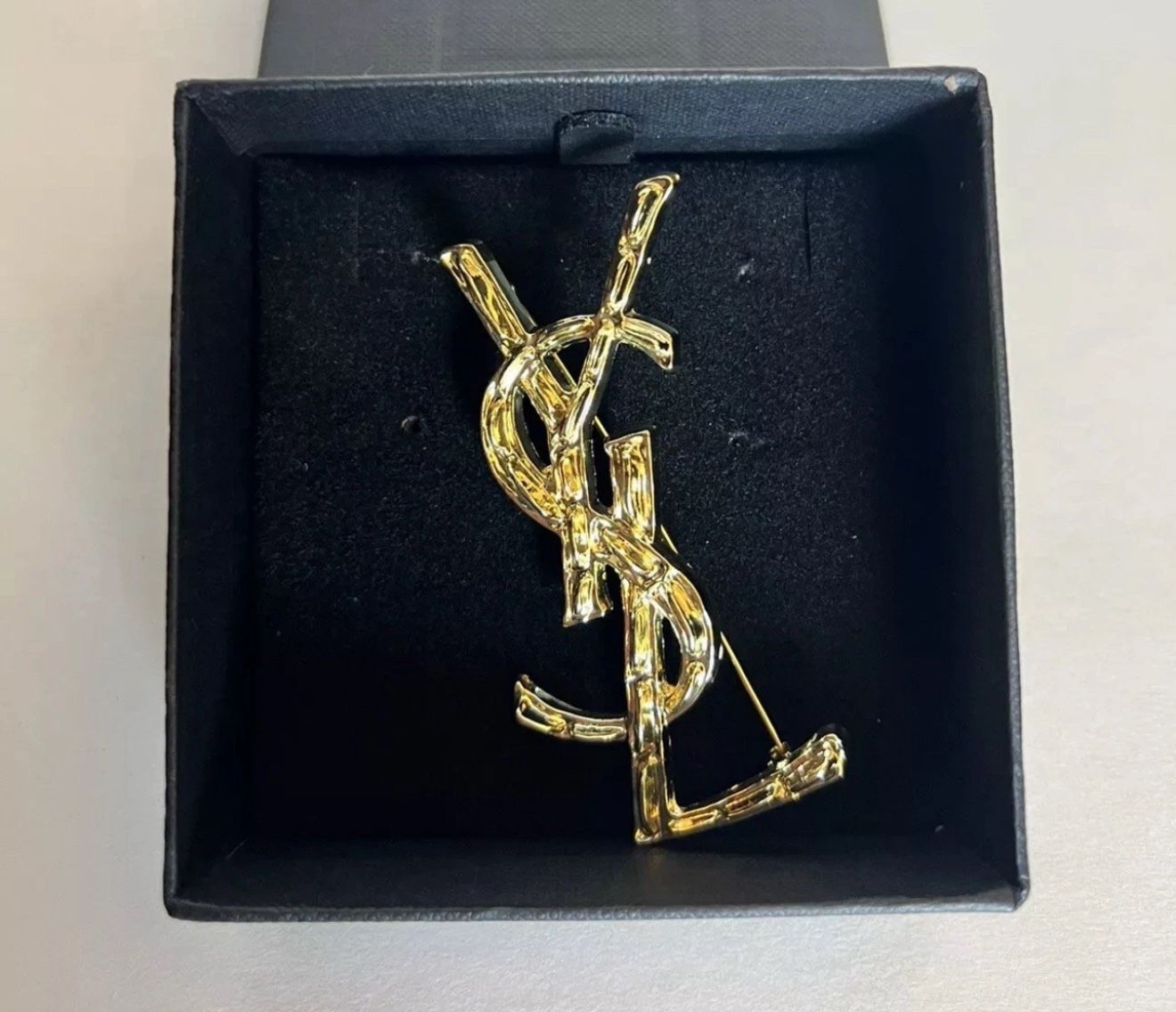Vintage Black And Gold Brooches